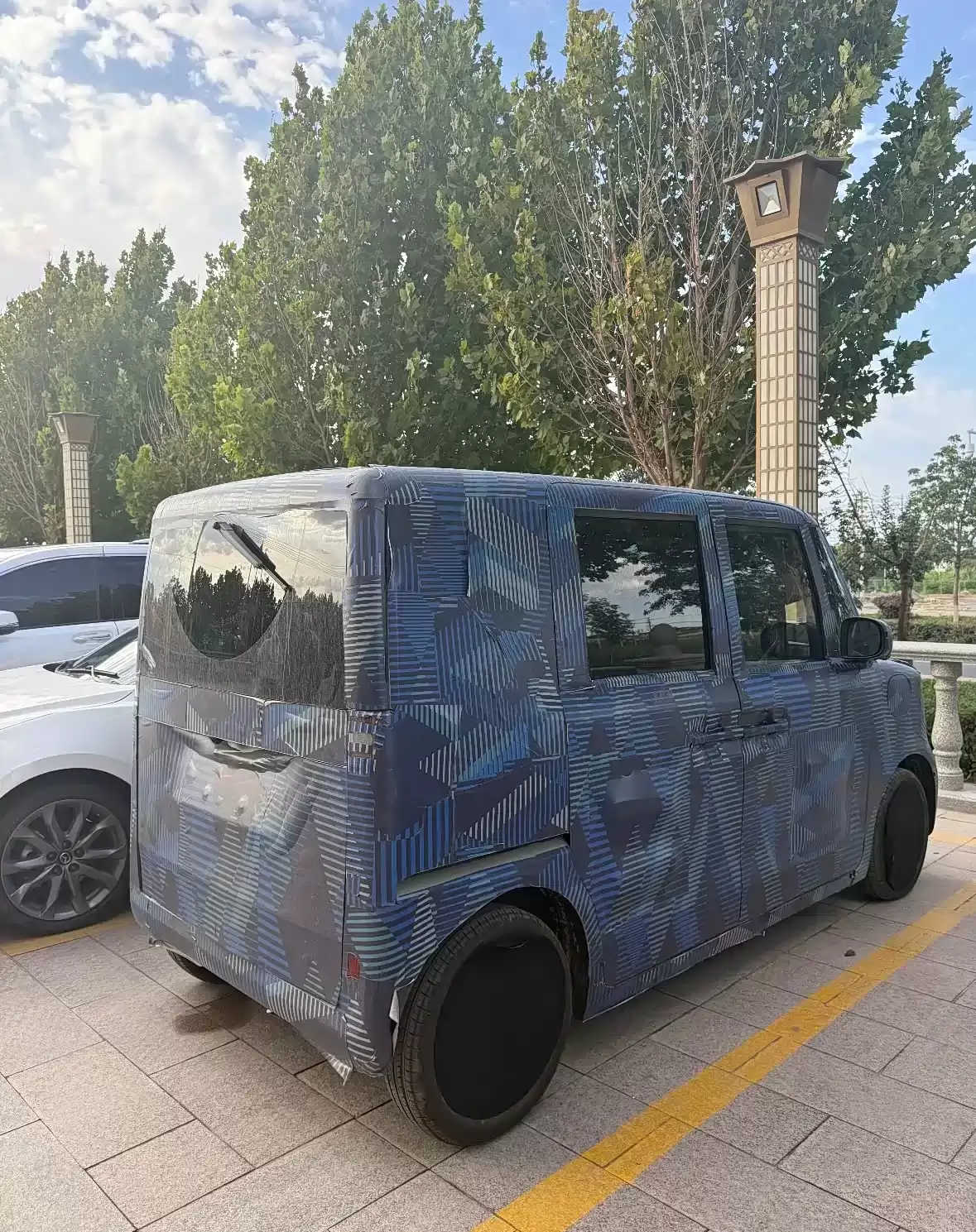 比亚迪全新纯电 K-Car 首张预告图发布，2025 东京车展首发