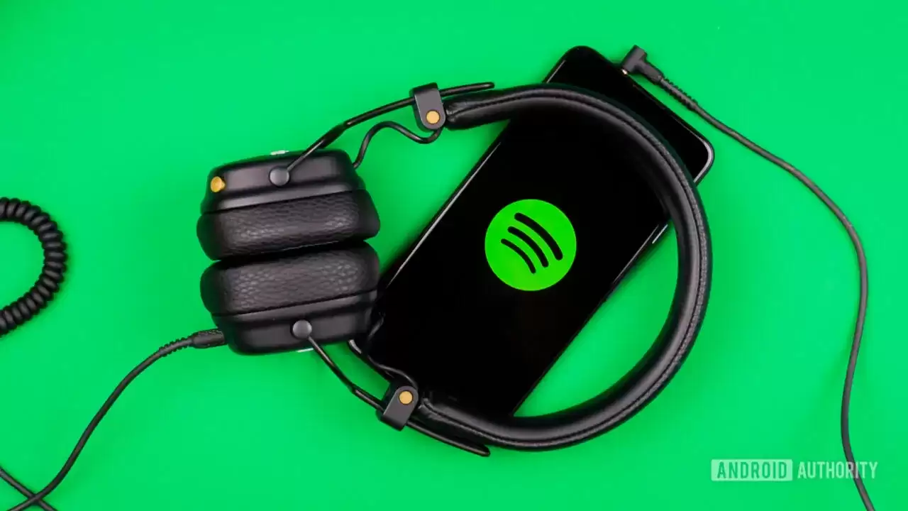 看书累了换听书：Spotify 探索听读同步，手机扫一扫、书本‘开口说话’