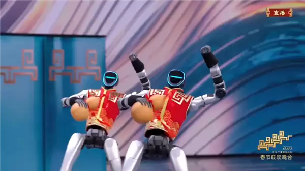 春晚宇树机器人摔倒了！王兴兴回应：导演安排的剧情需要